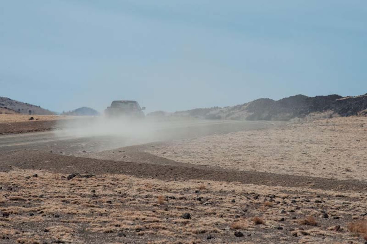 Car on a dusty Arizona road