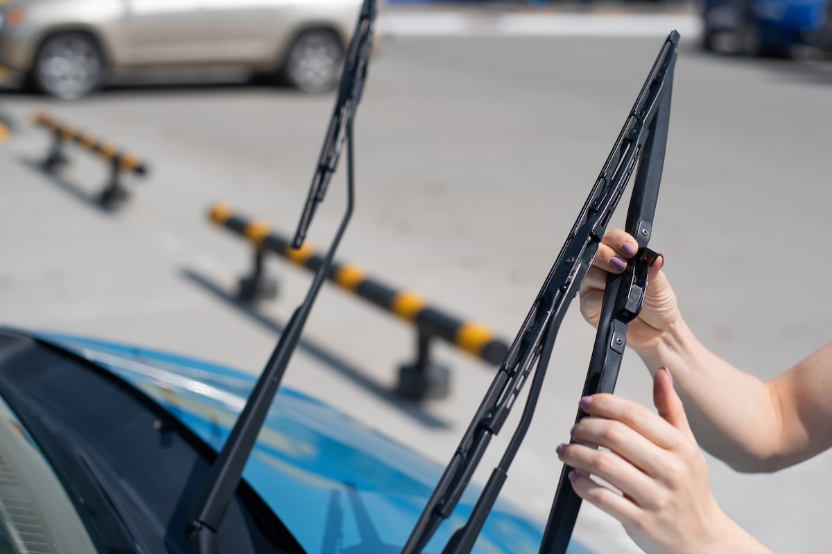 Checking windshield wipers before an Arizona road trip